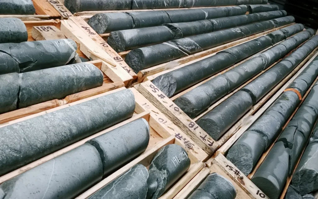 Drilled samples of minerals from the ground with copper.